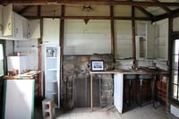 Kitchen area inside Jun Fujita’s cabin, 2025